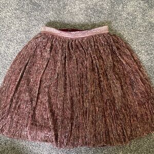 Girls sliver shimmery purple skirt. Size XS or 4-5. Brand social edition.